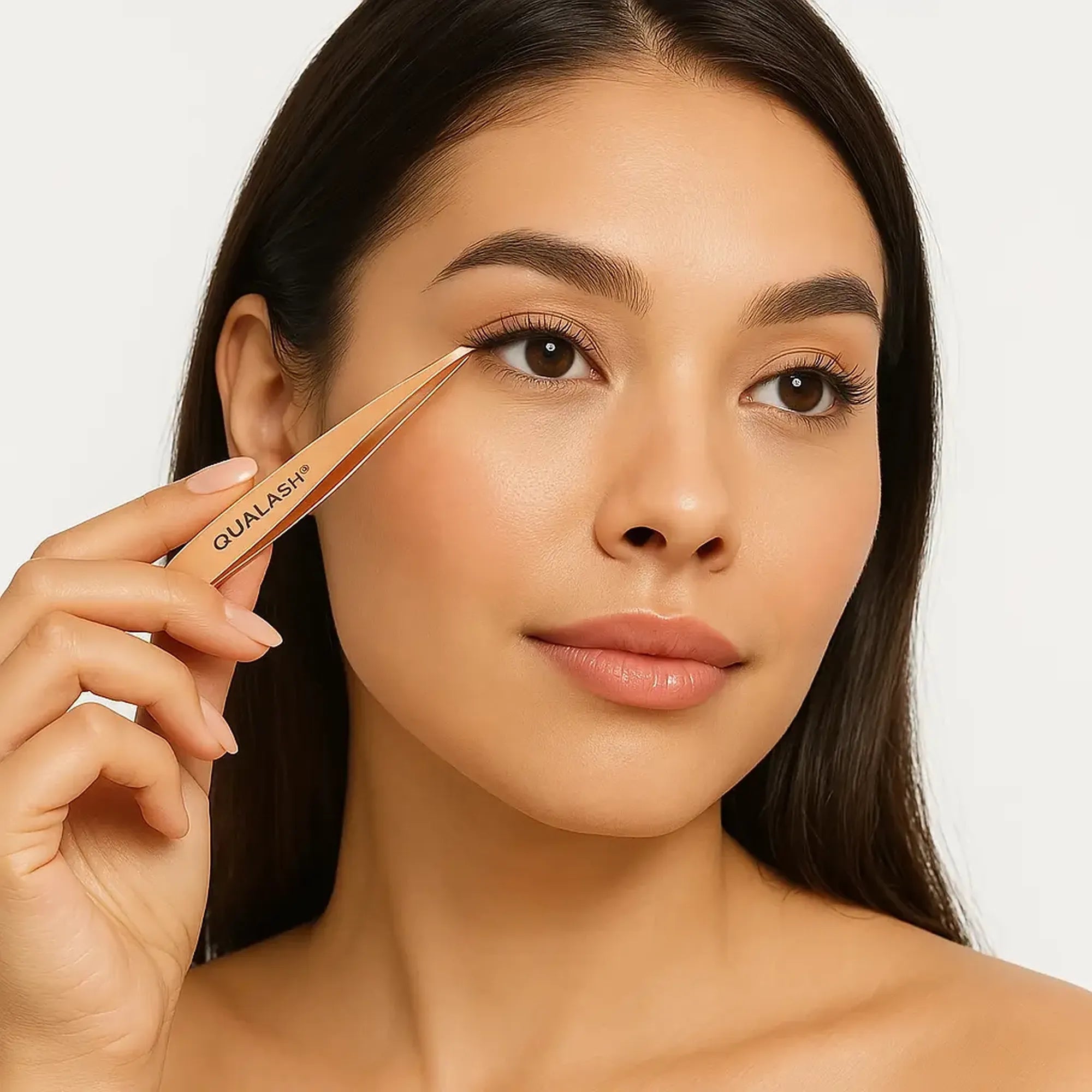 QUALASH Professional Tweezer in use – Model demonstrating eyebrow shaping with rose gold